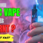Person holding a THC vape pen surrounded by colorful smoke representing burnt vape flavor and harsh hits